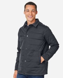 Harriton M821 Unisex Guardian Soft Shell Chore Coat – Dark Charcoal (on model side)