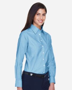 Harriton M600W Women’s Oxford Dress Shirt – Light Blue (on model side)