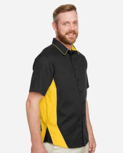 Harriton M586T Men’s Tall Flash IL Colorblock Shirt – Black/ Sunray Yellow (on model side)