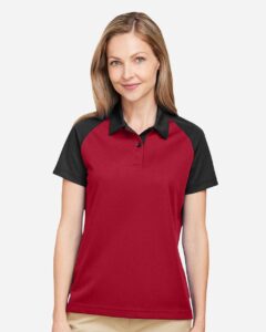Team 365 TT21CW Women’s Command Snag-Protection Colorblock Polo – Sport Red/ Black (on model)