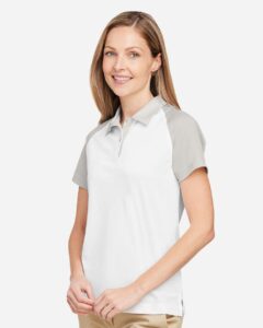 Team 365 TT21CW Women’s Command Snag-Protection Colorblock Polo – White/ Sport Silver (on model side)