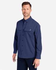 HUK H150184 Men’s Creekbed Pocket Fishing Shirt – Naval Academy (on model side)