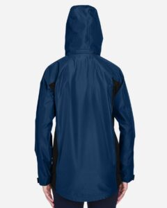 Team 365 TT86W Women’s Dominator Waterproof Jacket – Sport Dark Navy (on model back)