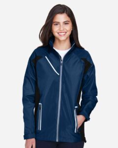 Team 365 TT86W Women’s Dominator Waterproof Jacket – Sport Dark Navy (on model)