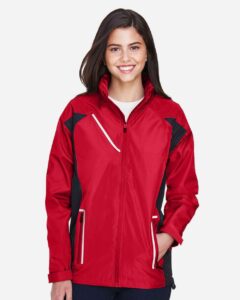 Team 365 TT86W Women’s Dominator Waterproof Jacket – Sport Red (on model)