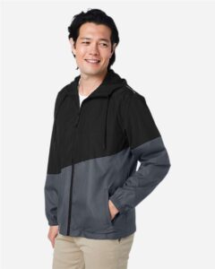 CORE365 CE710 Unisex Techno Lite Colorblock Windbreaker – Black/ Carbon (on model side)