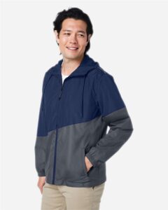 CORE365 CE710 Unisex Techno Lite Colorblock Windbreaker – Classic Navy Heather/ Carbon (on model side)