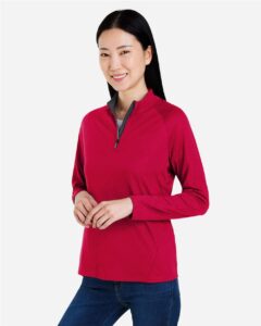 CORE365 CE418W Women’s Origin Performance Pique Quarter-Zip Pullover – Classic Red/ Carbon (on model side)