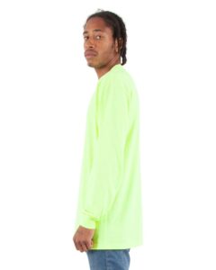 Shaka Wear SHALS Unisex Active Long Sleeve Tee – Safety Green (on model side)