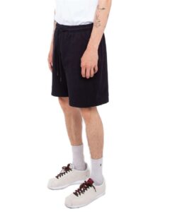 Shaka Wear SHGFS Unisex Garment-Dyed Shorts – Black (on model side)