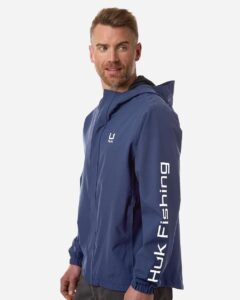 HUK H400159 Men’s Storm Rain Jacket – Naval Academy (on model side)