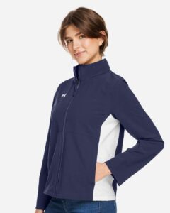 Under Armour 1389661 Women’s Rival Stretch Jacket – Midnight Navy/ White (on model side)