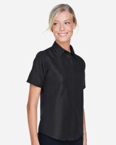 Harriton M580W Women’s Key West Short Sleeve Performance Staff Shirt – Black (on model side)