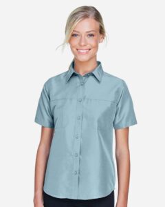 Harriton M580W Women’s Key West Short Sleeve Performance Staff Shirt – Cloud Blue (on model)