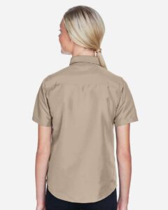 Harriton M580W Women’s Key West Short Sleeve Performance Staff Shirt – Khaki (on model back)