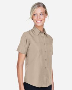 Harriton M580W Women’s Key West Short Sleeve Performance Staff Shirt – Khaki (on model side)