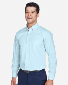 Devon & Jones D620 Men’s Crown Collection® Broadcloth Woven Dress Shirt – Crystal Blue (on model side)