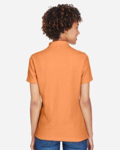 Devon & Jones DG150W Women’s DRYTEC20™ Performance Polo – Cantaloupe (on model back)
