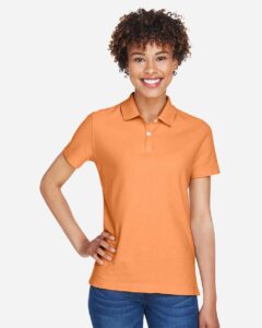 Devon & Jones DG150W Women’s DRYTEC20™ Performance Polo – Cantaloupe (on model)