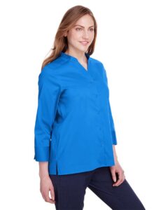 Devon & Jones DG560W Women’s Crown Collection® Stretch Broadcloth Three-Quarter Sleeve Blouse – French Blue (on model side)