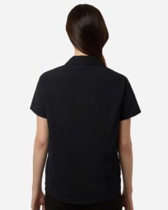 CORE365 CE520W Women’s UltraUVP Shoreline Short Sleeve Staff Shirt – Black (on model back)