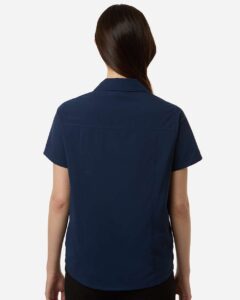CORE365 CE520W Women’s UltraUVP Shoreline Short Sleeve Staff Shirt – Classic Navy (on model back)