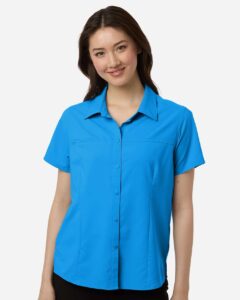 CORE365 CE520W Women’s UltraUVP Shoreline Short Sleeve Staff Shirt – Electric Blue (on model)