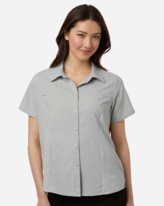 CORE365 CE520W Women’s UltraUVP Shoreline Short Sleeve Staff Shirt – Platinum (on model)