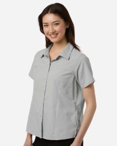 CORE365 CE520W Women’s UltraUVP Shoreline Short Sleeve Staff Shirt – Platinum (on model side)