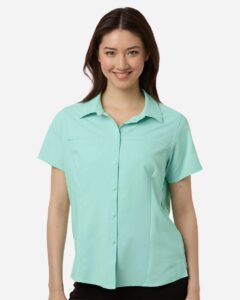 CORE365 CE520W Women’s UltraUVP Shoreline Short Sleeve Staff Shirt – Sea Glass (on model)