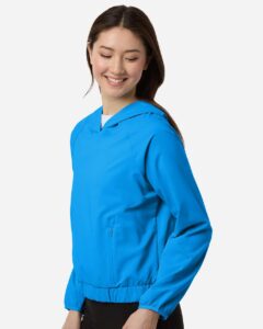 CORE365 CE520LW Women’s UltraUVP Shoreline Long Sleeve Hooded Pullover – Electric Blue (on model side)