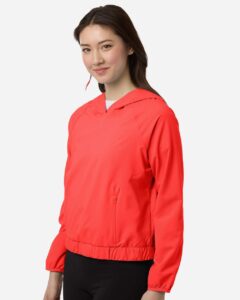 CORE365 CE520LW Women’s UltraUVP Shoreline Long Sleeve Hooded Pullover – Marina Red (on model side)