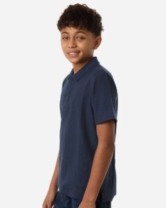 CORE365 CE106Y Youth Resolve CVC Performance Pique Polo – Classic Navy (on model side)