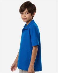 CORE365 CE106Y Youth Resolve CVC Performance Pique Polo – True Royal (on model side)