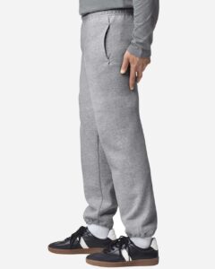 Gildan 18100 Unisex Heavy Blend™ Pocket Sweatpants – Sport Grey (on model side)