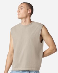 American Apparel 207GD Unisex Heavyweight Cotton Garment-Dyed Boxy Muscle Tee – Faded Bone (on model)