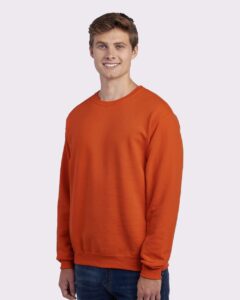 JERZEES 562MR Unisex NuBlend® Crewneck Sweatshirt – Burnt Orange (on model side)