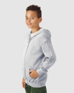 Gildan 18600B Youth Heavy Blend™ Full-Zip Hooded Sweatshirt – Sport Grey (on model side)