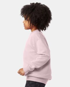Hanes P360 Youth EcoSmart® Crewneck Sweatshirt – Pale Pink (on model side)