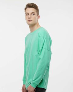 J. America 8229 Unisex Game Day Jersey Long Sleeve T-Shirt – Mint (on model side)