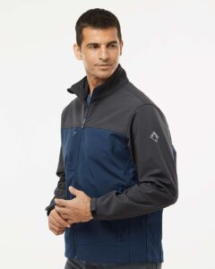 DRI DUCK 5350 Men’s Motion Soft Shell Jacket – Deep Blue/ Charcoal (on model side)