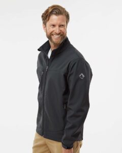 DRI DUCK 5350T Men’s Tall Motion Soft Shell Jacket – Charcoal (on model side)