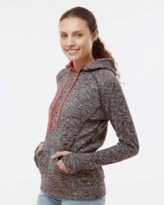 J. America 8616 Women’s Cosmic Fleece Hooded Sweatshirt – Charcoal Fleck/ Fire Coral (on model side)