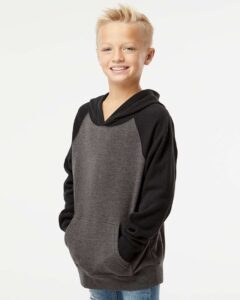 Independent Trading Co. PRM15YSB Youth Lightweight Special Blend Raglan Hooded Sweatshirt – Carbon/ Black (on model side)