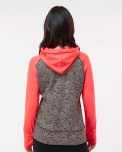J. America 8618 Women’s Colorblocked Cosmic Fleece Hooded Sweatshirt – Charcoal Fleck/ Fire Coral (on model back)