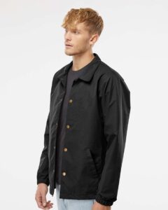 Independent Trading Co. EXP99CNB Men’s Water-Resistant Windbreaker Coach’s Jacket – Black (on model side)