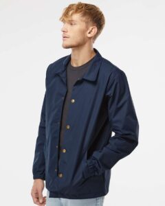 Independent Trading Co. EXP99CNB Men’s Water-Resistant Windbreaker Coach’s Jacket – Classic Navy (on model side)