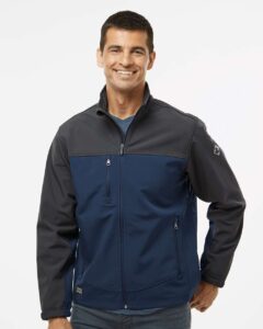 DRI DUCK 5350T Men’s Tall Motion Soft Shell Jacket – Deep Blue/ Charcoal (on model)
