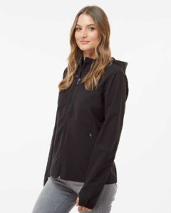 DRI DUCK 9411 Women’s Ascent Soft Shell Hooded Jacket – Black (on model side)