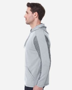 J. America 8435 Men’s Omega Stretch Hooded Sweatshirt – Silver Grey Triblend (on model side)
